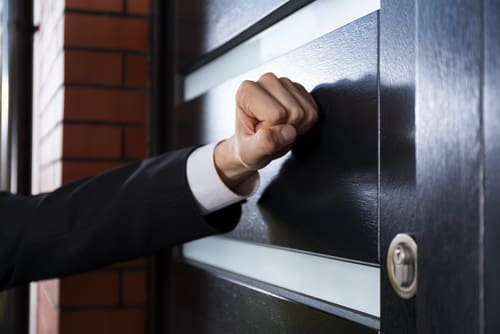 IRS agent knocking on door