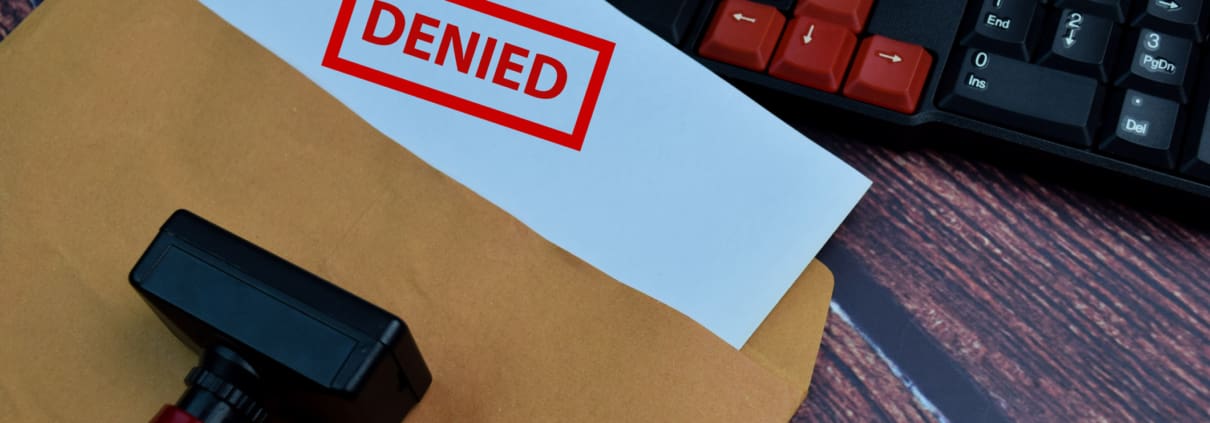 a rubber stamp sitting on top of a piece of paper next to a keyboard
