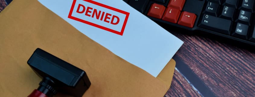 a rubber stamp sitting on top of a piece of paper next to a keyboard