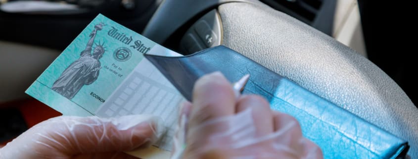 woman holding a passbook