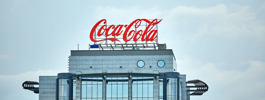 Coca-Cola advertising on the roof of a building in the city center