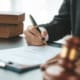A lawyer sits in his office