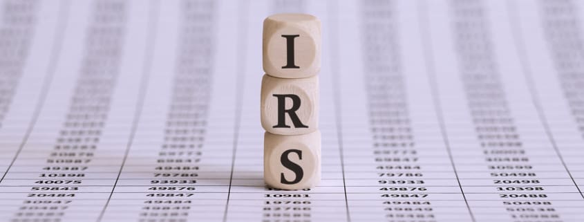 IRS word on a wooden cubes on chart background