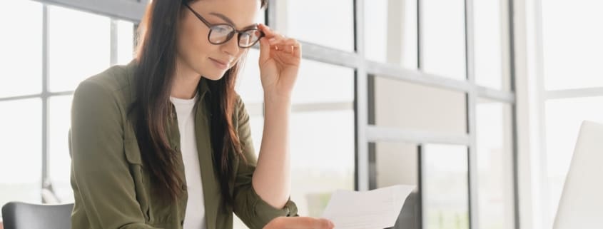 Woman reading a paper