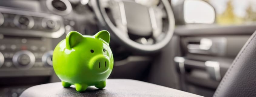 A piggybank on a car