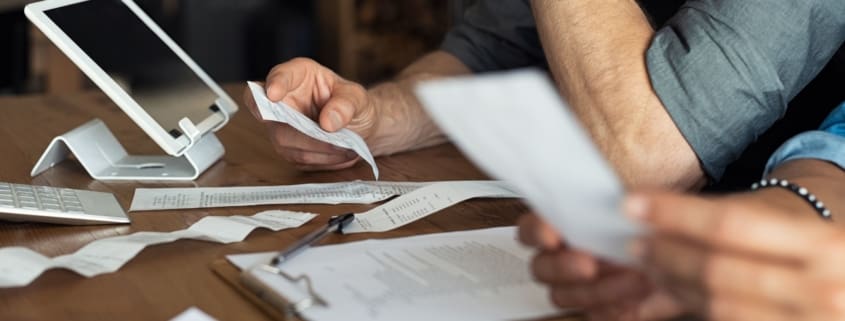 Man holding a receipts