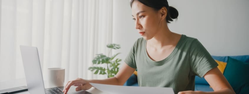 Woman holding a paper