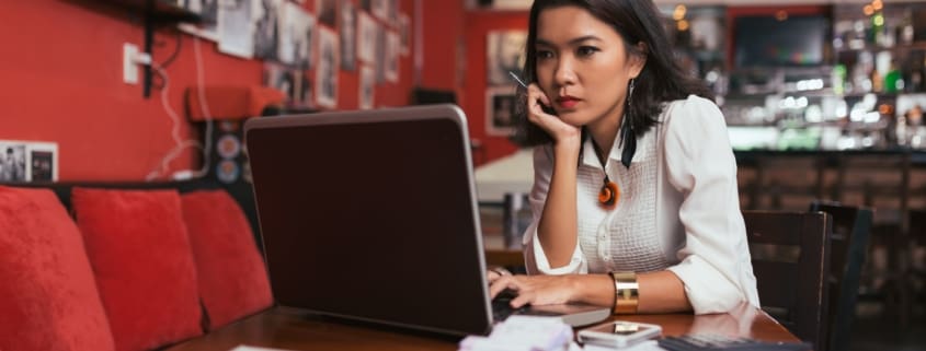 Woman looking at a laptop